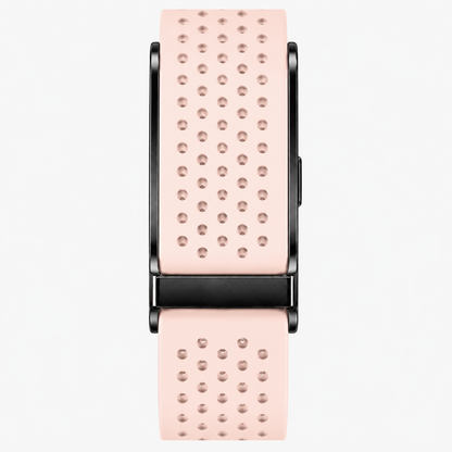 Bracelet RYTM en silicone perforé rose poudré, vu de face à plat, boucle noire.